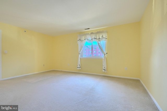 spare room with carpet