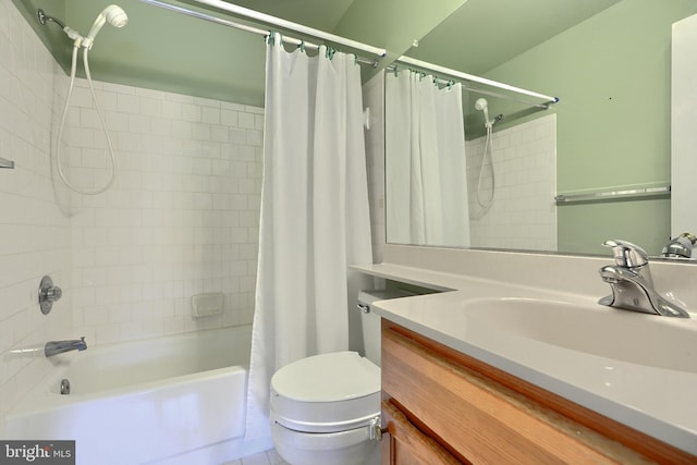 full bathroom featuring vanity, toilet, and shower / bath combo with shower curtain