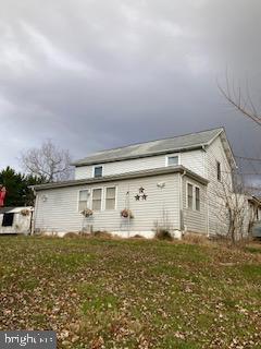 exterior space with a front yard