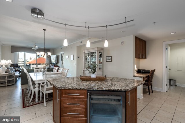 2 48th St Unit 214, Ocean City, MD 21842 - kitchen featuring wine cooler, open floor plan, light tile patterned flooring, and ceiling fan