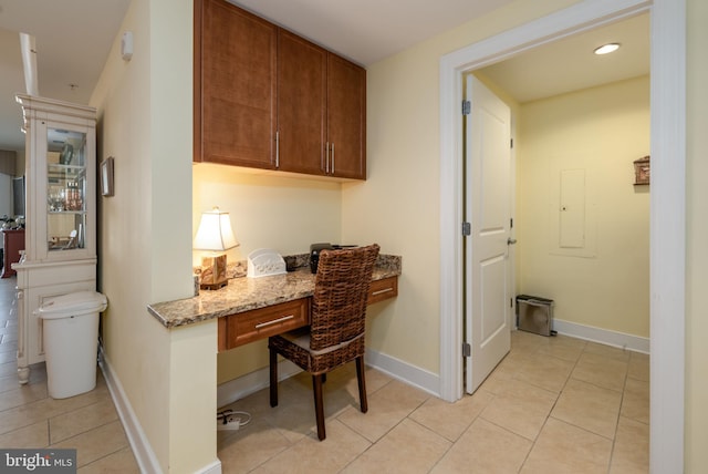 2 48th St Unit 214, Ocean City, MD 21842 - office area featuring built in study area, light tile patterned floors, electric panel, and recessed lighting