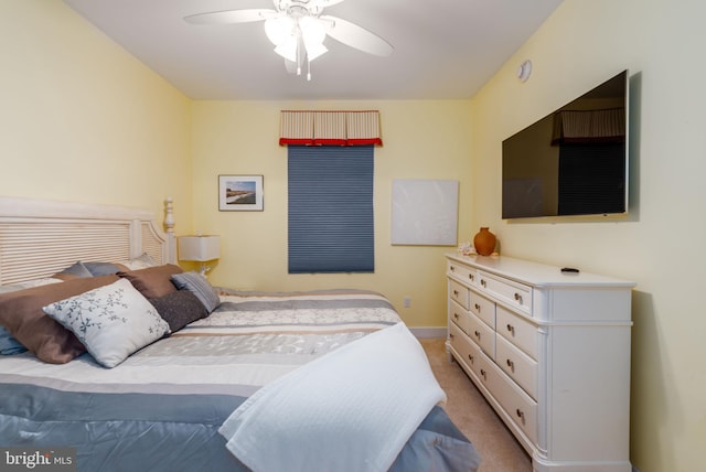 2 48th St Unit 214, Ocean City, MD 21842 - carpeted bedroom featuring baseboards and a ceiling fan