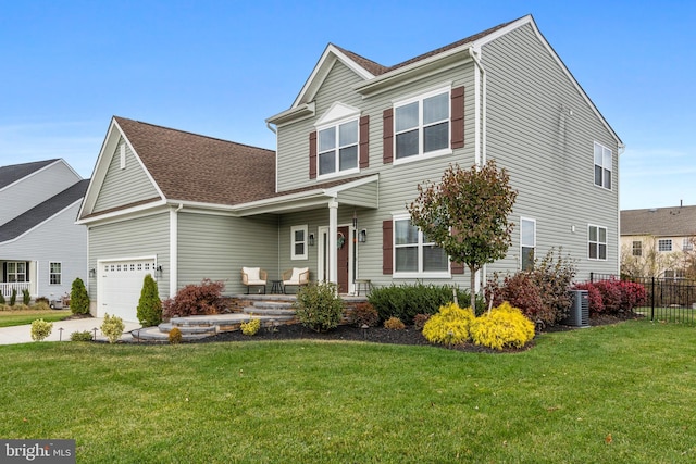 view of front of house featuring central air condition unit and a front yard