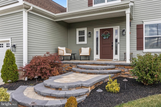 property entrance with covered porch