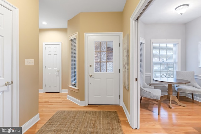 entrance foyer featuring light hardwood / wood-style floors