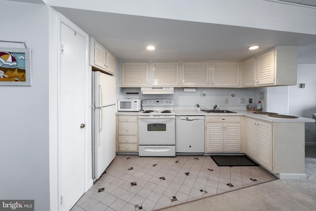 kitchen featuring light tile patterned floors, white appliances, sink, and extractor fan