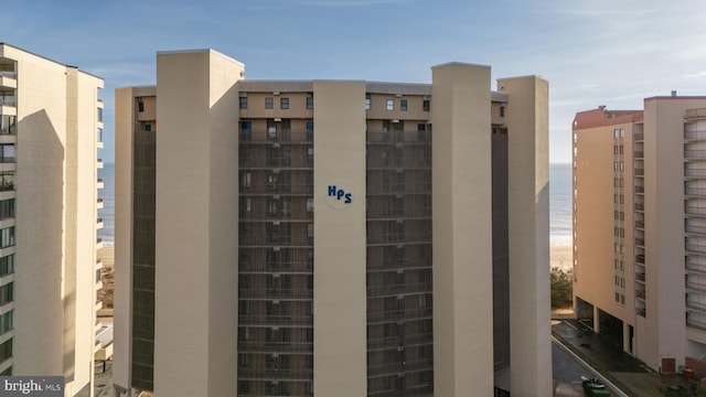 view of building exterior featuring a water view