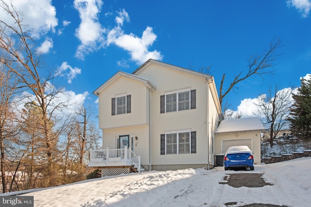 front facade with a garage