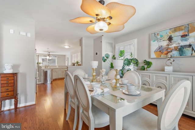 dining room featuring light hardwood / wood-style floors and sink