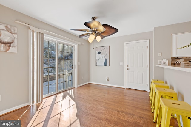 interior space featuring ceiling fan and light hardwood / wood-style floors