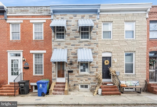 1345 Cooksie St, Baltimore, MD 21230 - view of property featuring entry steps and stone siding