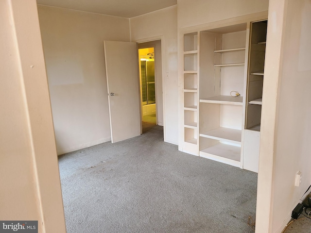 unfurnished bedroom featuring carpet flooring