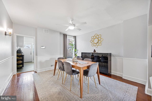 dining area featuring dark hardwood / wood-style floors and ceiling fan