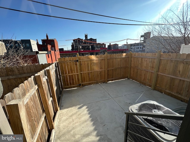 view of patio with central air condition unit