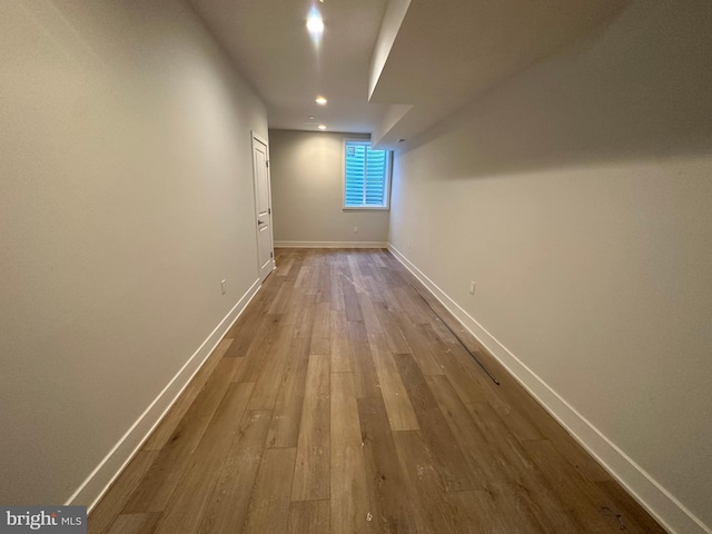 hallway featuring hardwood / wood-style floors