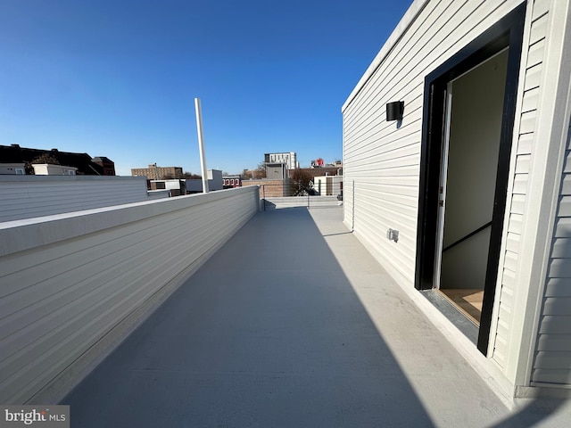 view of patio / terrace with a balcony