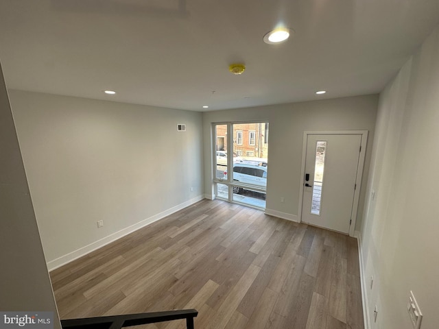 entrance foyer featuring light hardwood / wood-style flooring