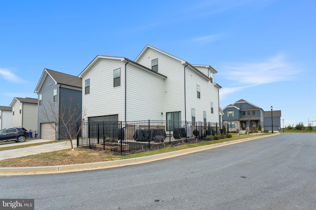 view of property exterior with a garage