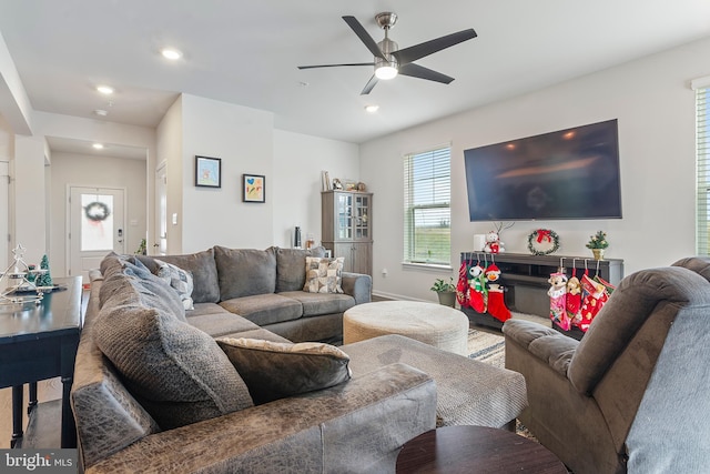 living room featuring ceiling fan