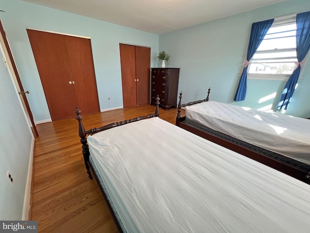 bedroom featuring hardwood / wood-style flooring