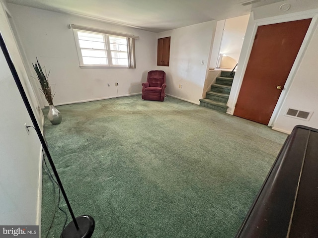 unfurnished room with carpet floors