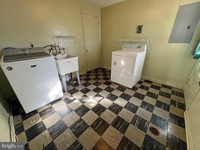 clothes washing area featuring independent washer and dryer and electric panel