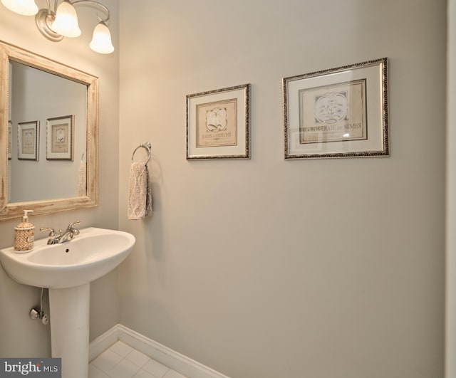 bathroom featuring tile patterned floors and sink