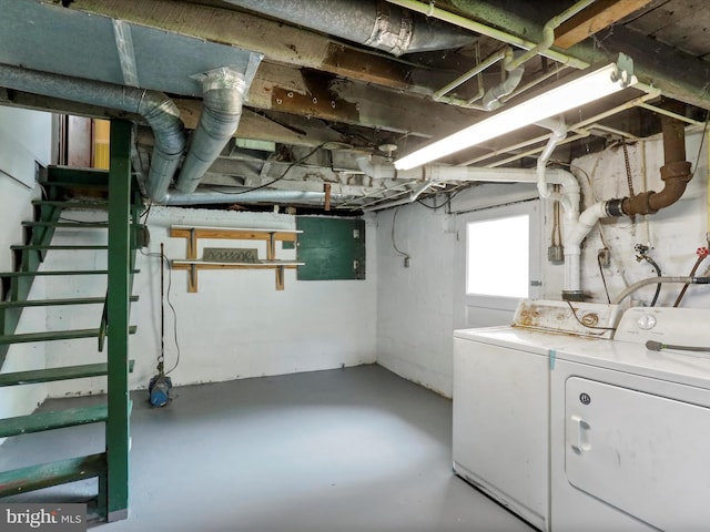 basement featuring washer and dryer