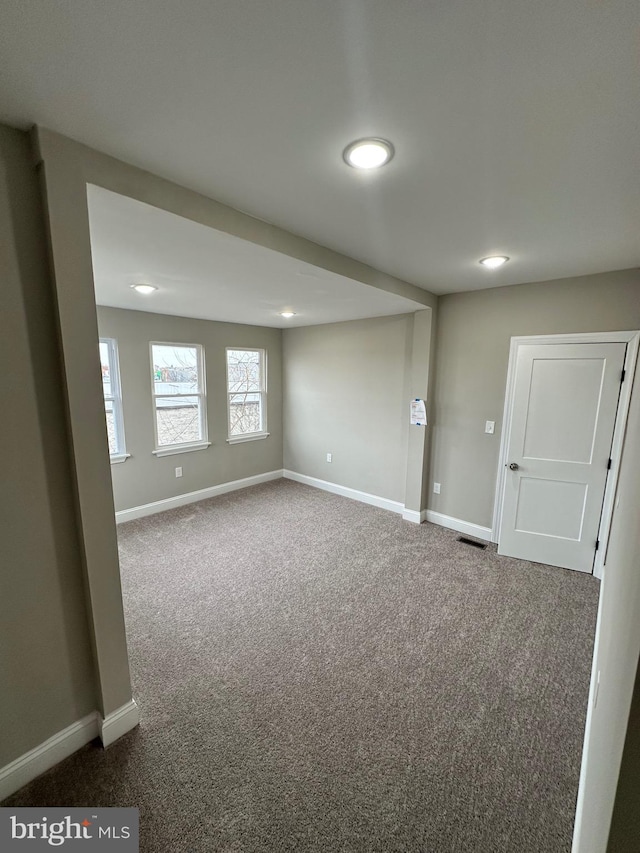 basement featuring carpet floors