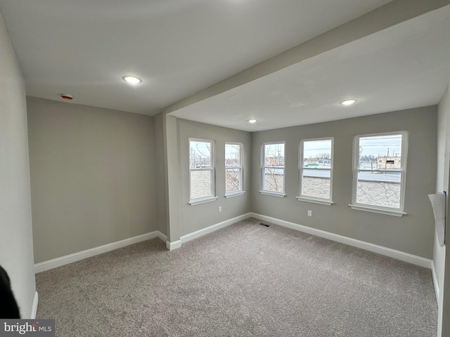 view of carpeted spare room