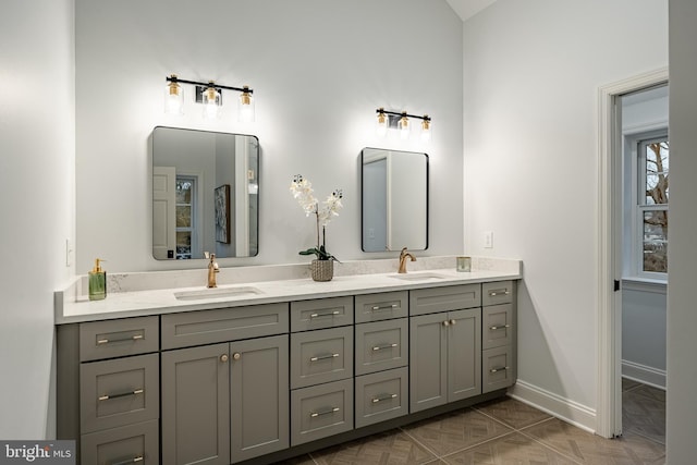 bathroom featuring tile patterned flooring and vanity