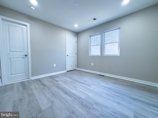 empty room featuring light hardwood / wood-style floors