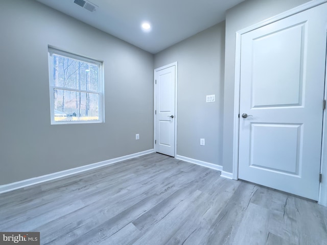 unfurnished bedroom featuring light hardwood / wood-style flooring