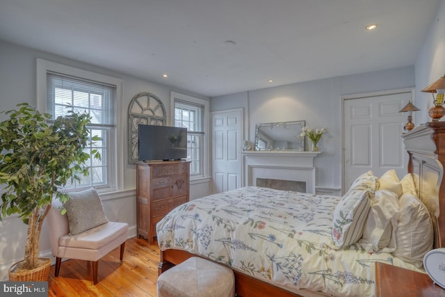 bedroom featuring light wood-type flooring