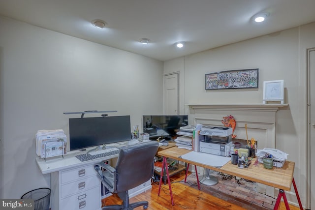 office space featuring light wood-type flooring