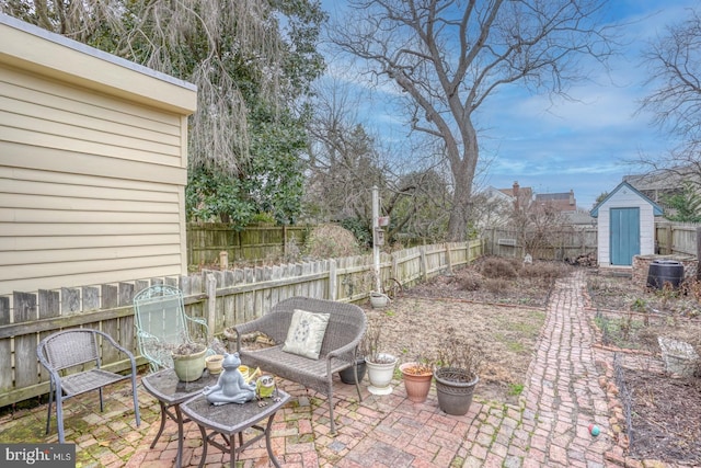 view of patio with a storage shed