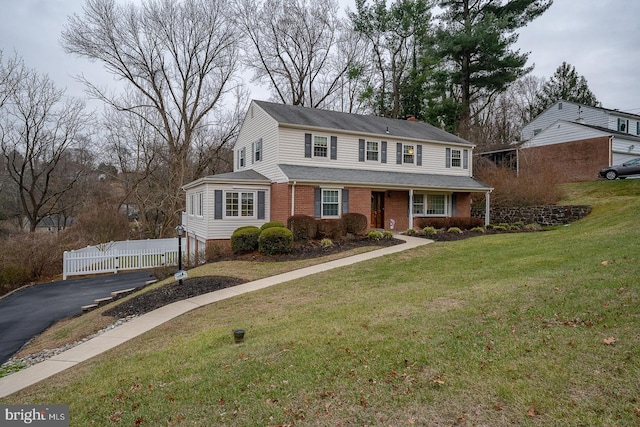 view of property featuring a front yard