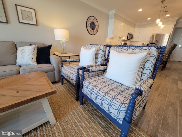 living room featuring crown molding