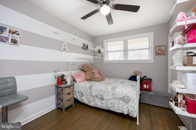 bedroom featuring dark hardwood / wood-style floors and ceiling fan