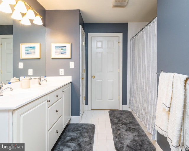 bathroom featuring vanity and tile patterned floors