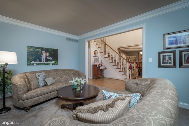 living room featuring crown molding