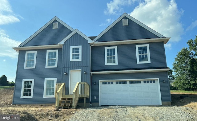 view of front of property with a garage