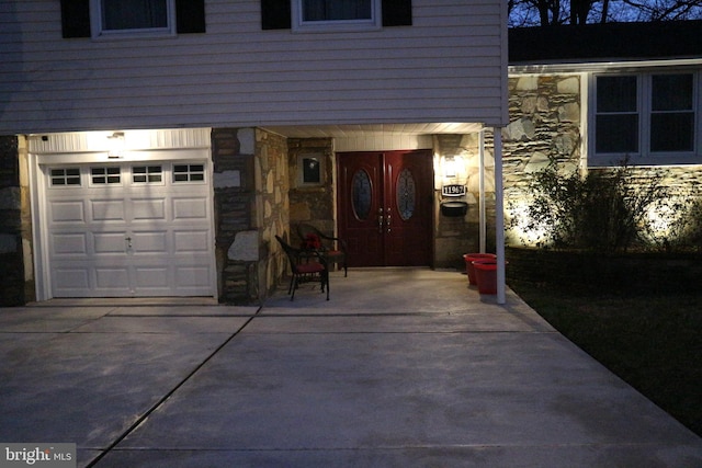 property entrance featuring a garage