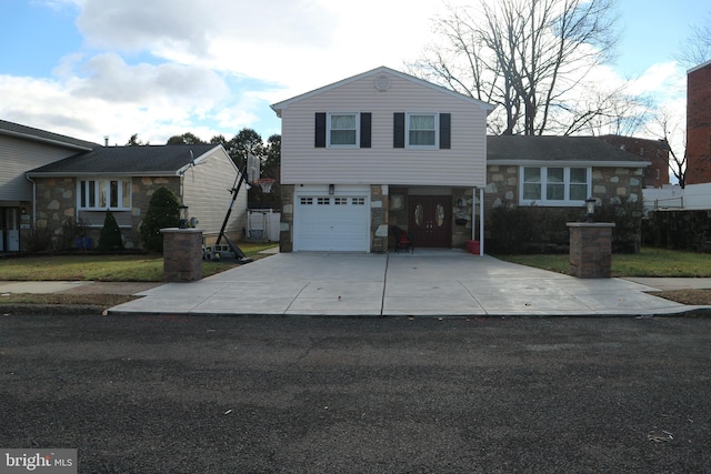 tri-level home featuring a garage