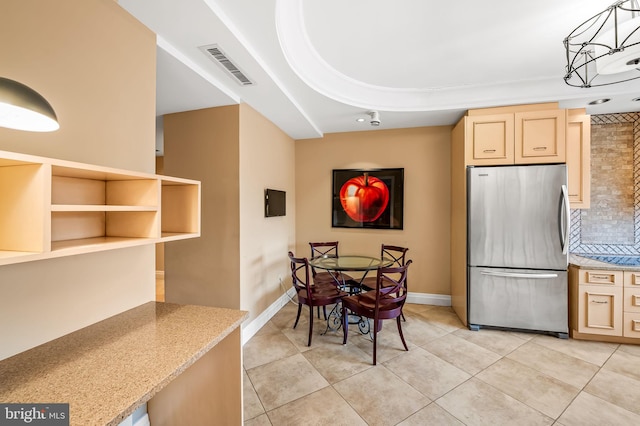 dining room with light tile patterned floors