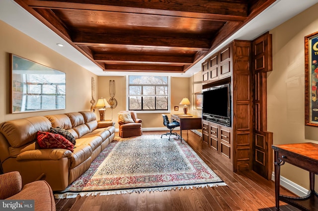 living room featuring hardwood / wood-style flooring and beamed ceiling