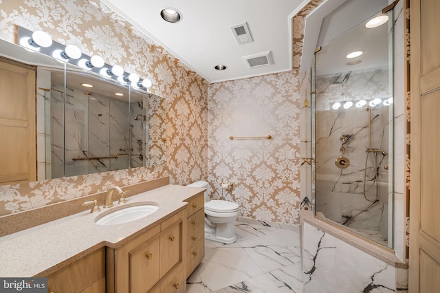 bathroom featuring vanity, an enclosed shower, and toilet