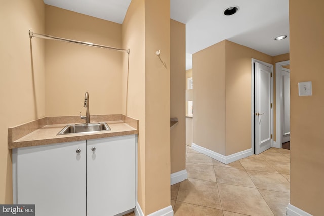 bathroom featuring tile patterned floors and sink