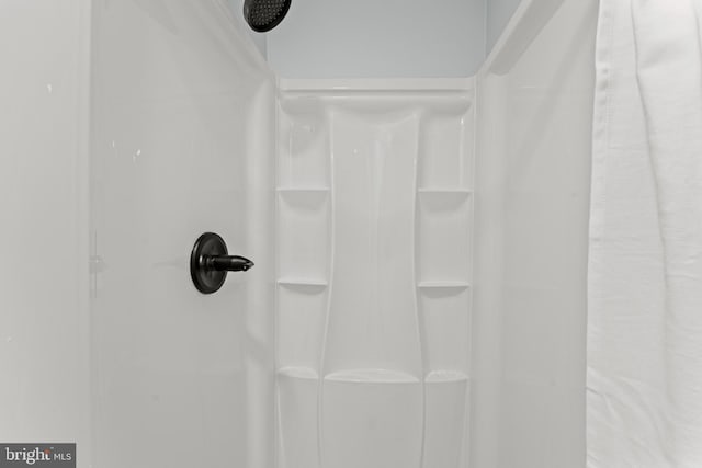 interior details with a shower