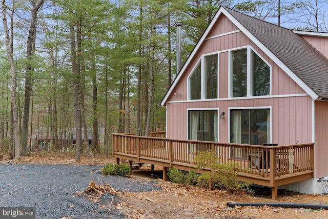 exterior space featuring a wooden deck